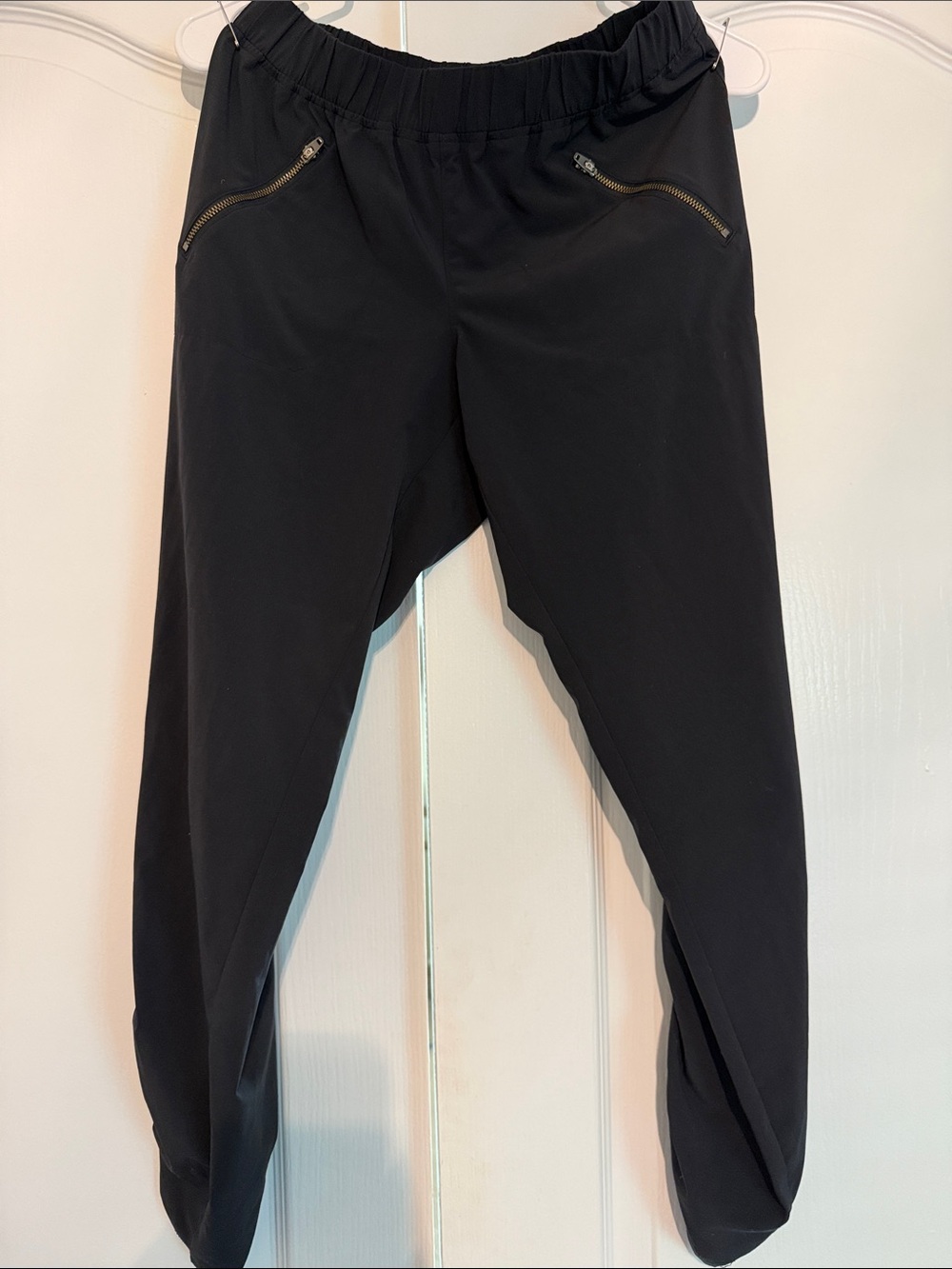 Athleta Women Size 2 black joggers, adjustable tie ankles, zipper pockets